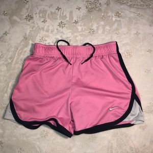 I’m selling these pinkish Nike shorts